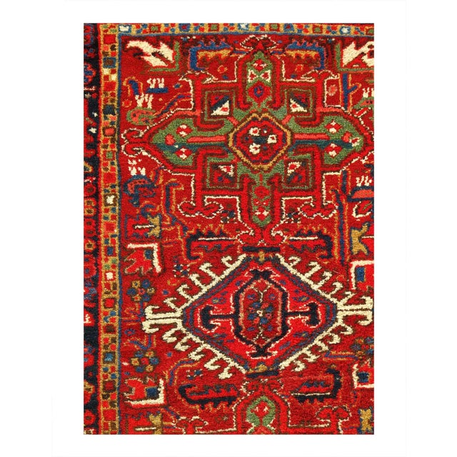 Established with luxurious jewel tones, this antique Karaje rug from Persia is a striking piece. It is engagingly accented...