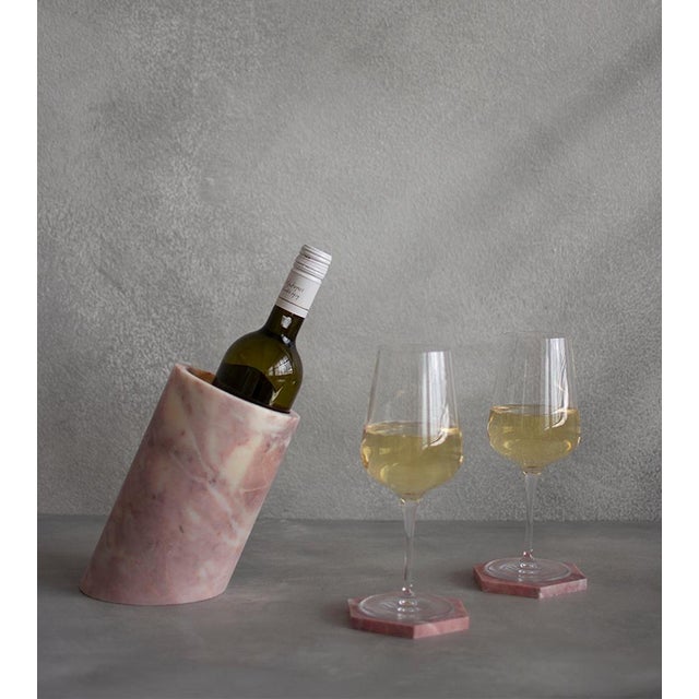 Our wine cooler is designed by us and hand crafted by the artisans within the fair-trade principles. The natural...