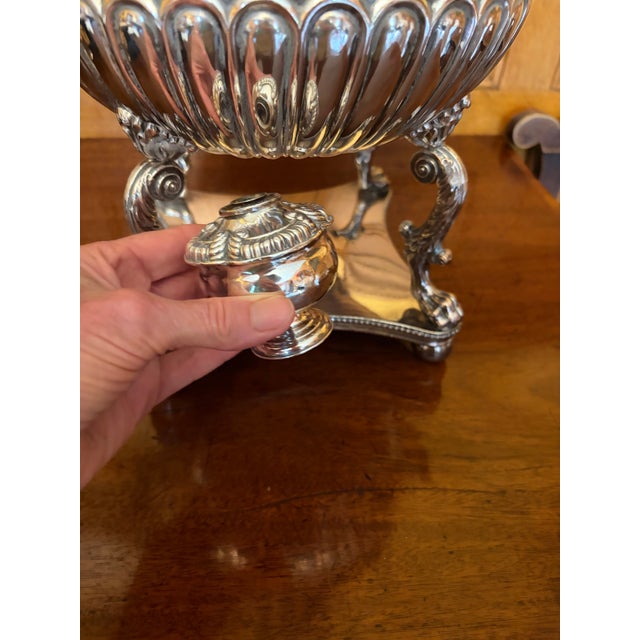 This antique silver-plated hot water samovar features classical Regency- or Georgian-style craftsmanship with ornate cast...
