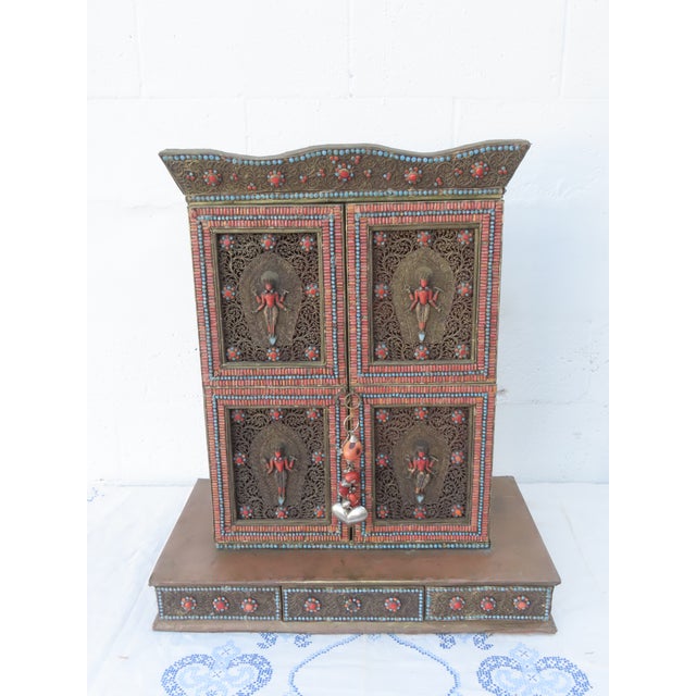 This incredible Prayer Cabinet / Shrine is handmade out of wood and metal. This stunning altar piece features panels of...