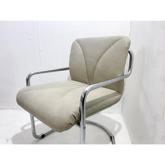 Mid-century set of 4 tubular armchairs by Guido Faleschini - Italy 1970s. This piece is attributed to the mentioned...