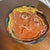 A studio pottery handcrafted ceramic decorative plate/charger featuring a bold, Picasso-inspired abstract face portrait....