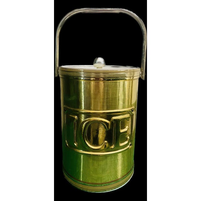 This Mid-Century ice bucket sign by Georges Briard is a large size, gold color. Perfect for your next party and a great...