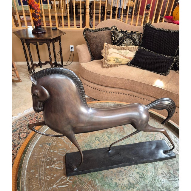 From the living estate of Arizona based brutalist artist John Gleason, this elegant Etruscan-inspired bronze equestrian...