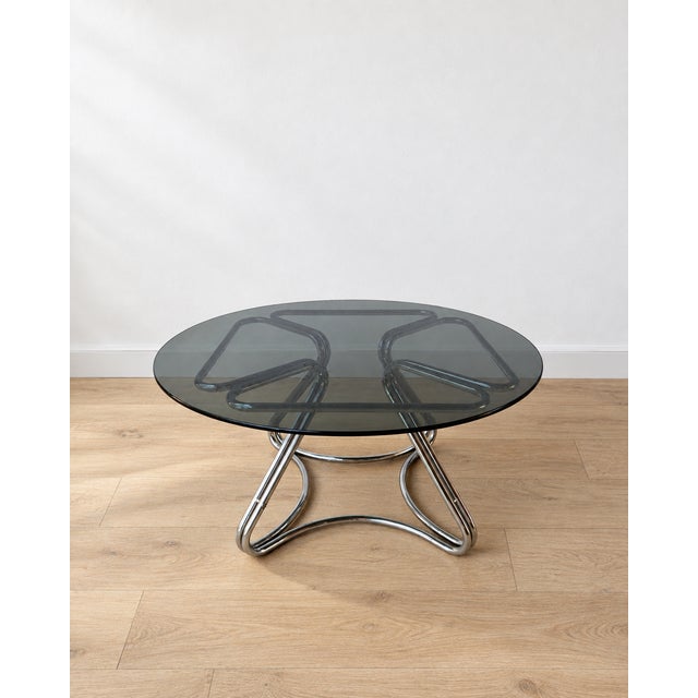 Gorgeous vintage coffee table from the 1970s, perfect for enhancing modern, industrial, or contemporary interiors. Iconic...
