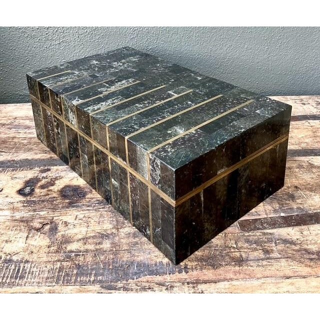 This striking vintage box is a masterpiece of Postmodern design, featuring a sophisticated tessellated stone exterior in a...