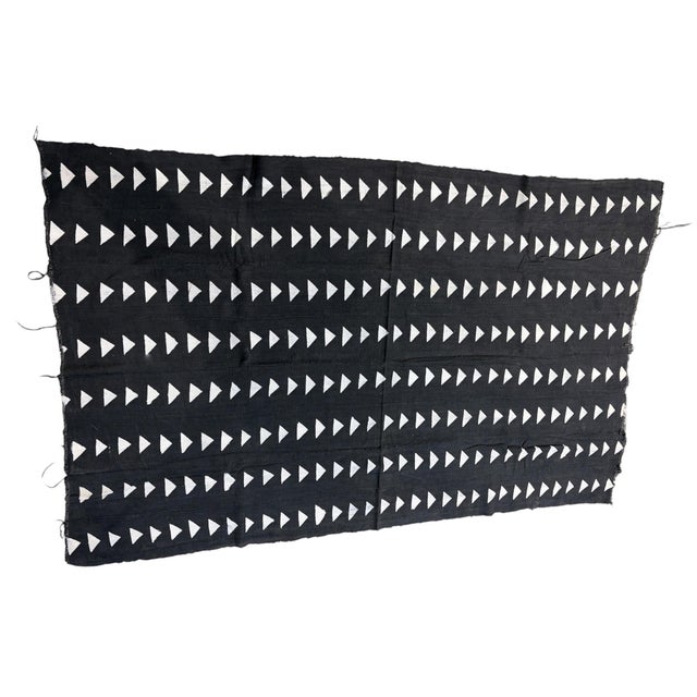Vintage hand weaving from 100% cotton, this authentic mud-cloth textile is made by the skilled artisans of the Bamana...