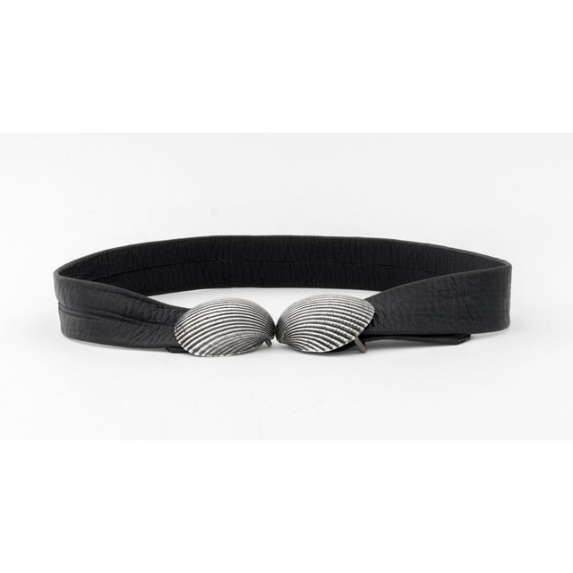 Clam Shell Form Silver Belt Buckle Leather Belt, marked "Sterling". Weight: 4.54 ozt. inclusive; 27" L x 2.25" W x 0.75"...