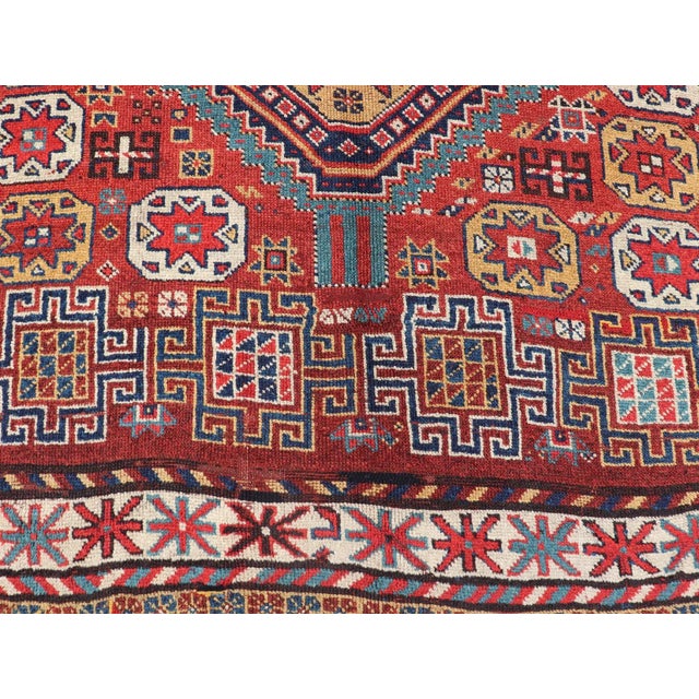Red Antique Qashqai Rug With Geometric Motifs in Red, Blue, and Golden Yellow For Sale - Image 8 of 13