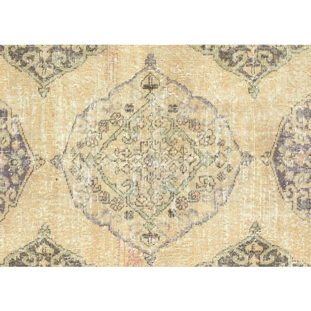 1960s Turkish Oushak Rug. Handwoven with wool on wool foundation in the Oushak region of Western Turkey. The Anatolian...