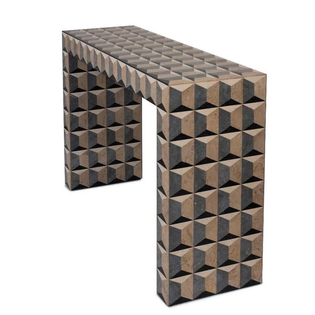 Inspired by the graphic patterns of Fornasetti, the Milano console presents a striking architectural silhouette. Skilled...