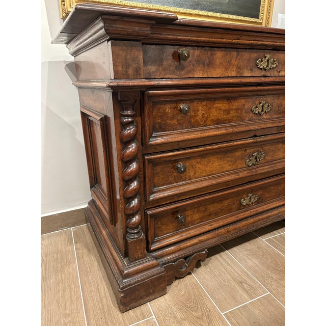 Beautiful chest of drawers with compact dimensions, typical of central Italian production during the 17th century. The...