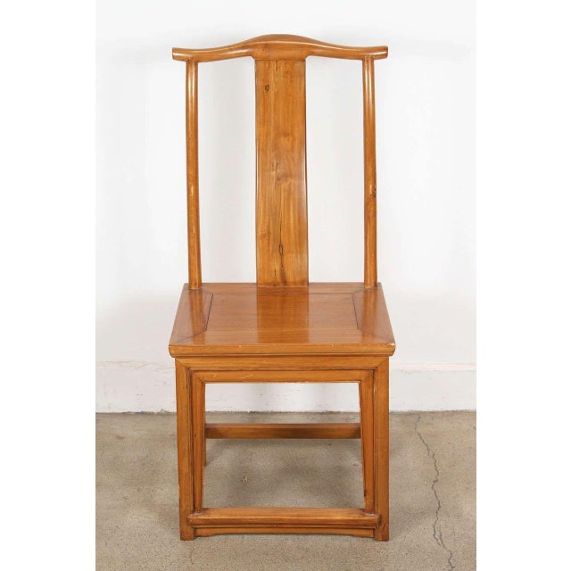 Set of eight Yoke high back Chinese dining room chairs in Ming style. Handcrafted elmwood. There is some damages on the...