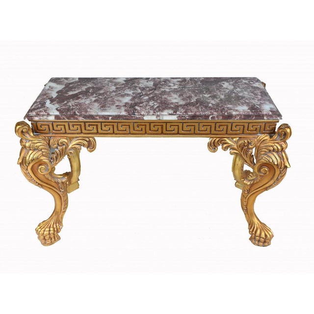 Classy Italian baroque gilt console table Hand carved base very detailed and elegant with lions paw feet Other details...