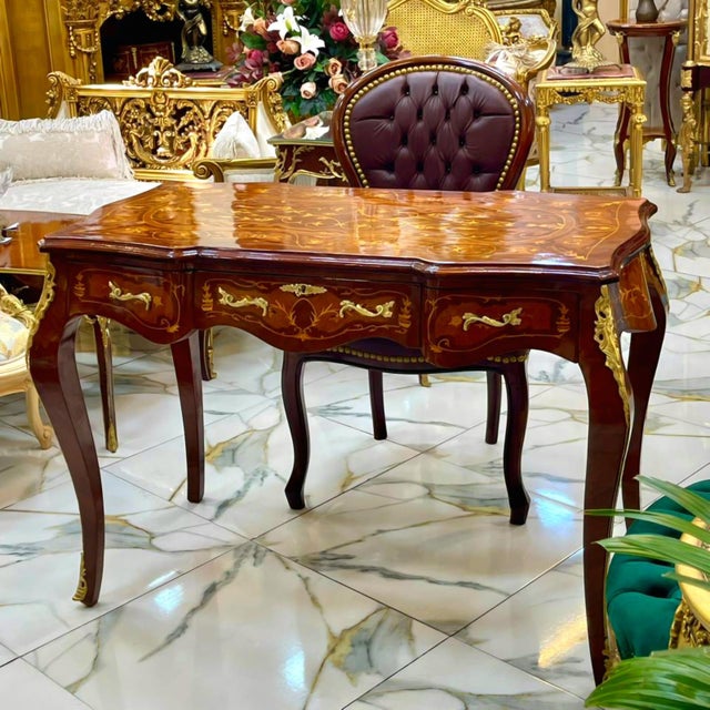 Elevate your office or study with this stunning French Louis XV-style writing desk, featuring an exquisite floral...