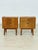 Beautiful pair of original vintage bedside tables in a timeless mid-century design. The cabinets impress with their...