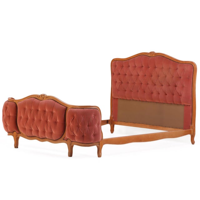 This elegant 1940's bed features a beautifully carved wooden frame with ornate detailing characteristic of its period. The...