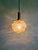 Amber bubble glass pendant light with a brass frame, designed by helena tynell for the german manufacturer glashütte...