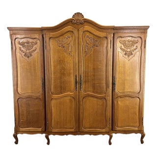 Vintage French Louis XVI Style Carved Oak 4-Door Armoire For Sale