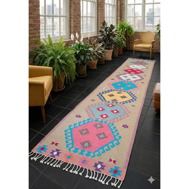 This distinguished vintage kilim from the 1960s represents the authentic textile traditions of the Akdeniz (Mediterranean)...