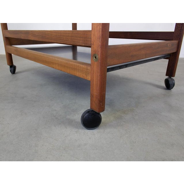 Børge Mogensen tray table with frame of oak. Plates of black laminate. with tray. Mounted on wheels. Model 5370, made by...