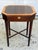 Beautifully crafted Georgian side table made of flame mahogany with satinwood banding. Lift top, cross stretcher and...