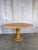 Exceptional 19th-century French Provincial pedestal table with drop-leaf top. This versatile table functions as both a...