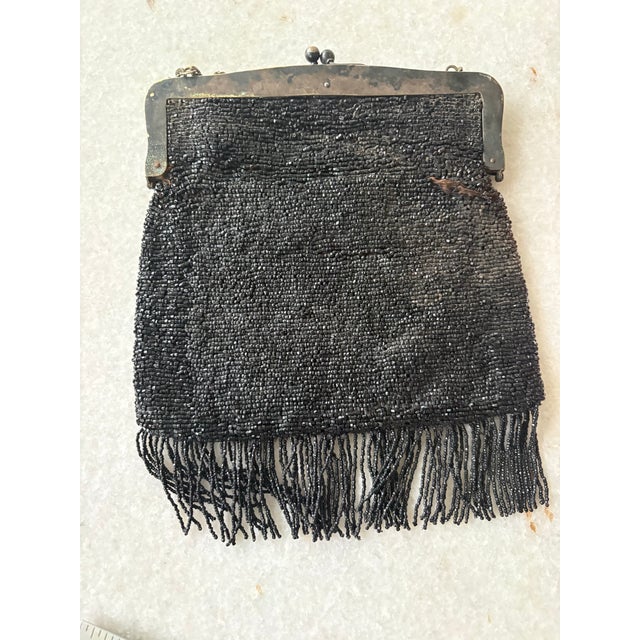 Lovely antique art Deco silver plate hand beaded handbag.