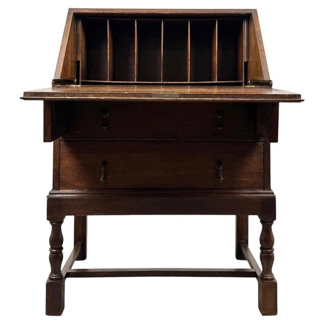 A charming and beautifully proportioned early 20th-century Edwardian oak bureau, combining traditional period styling,...