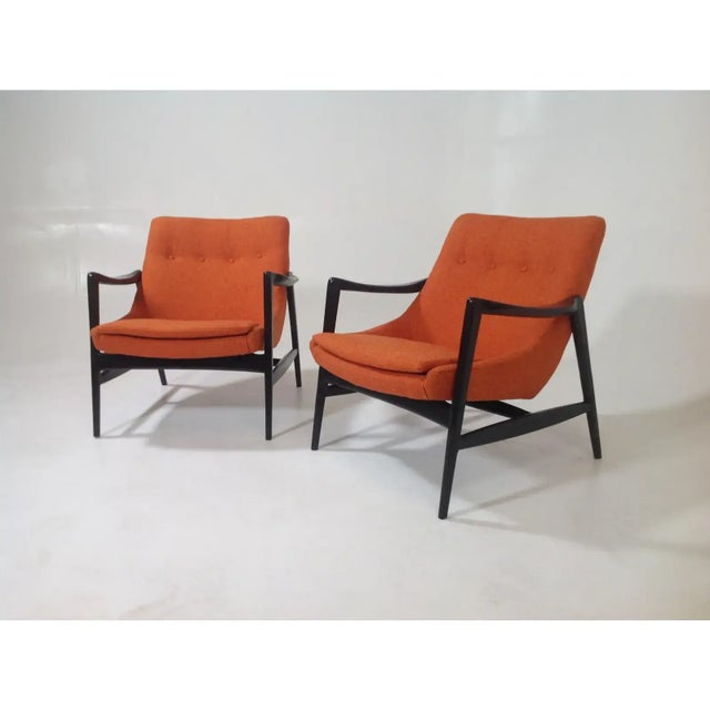 Mid-Century Modern lounge chairs in the style of Ib Kofod-Larsen. Stunning lounge chairs, mid-century style at its finest!...