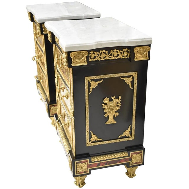 This pair of antique style marble top boulle style end tables/nightstands is a licensed reproduction from the 1960s,...