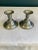 This matching pair of vintage pewter candlestick holders brings understated elegance to any setting. Crafted with graceful...