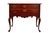 A Queen Anne style lowboy in mahogany, made by Hickory Chair Company. Two dovetailed drawers open with bail handles on...