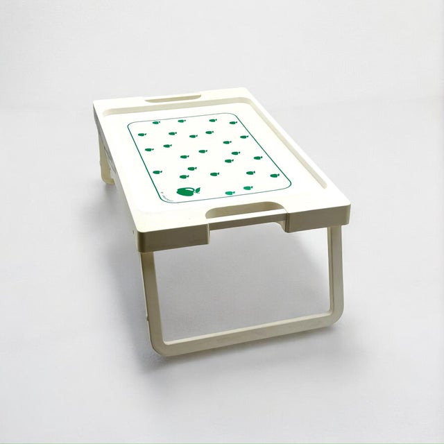 This folding bed tray, model Bonjour, was produced by Lavatelli in Italy during the 1970s and combines functional design...