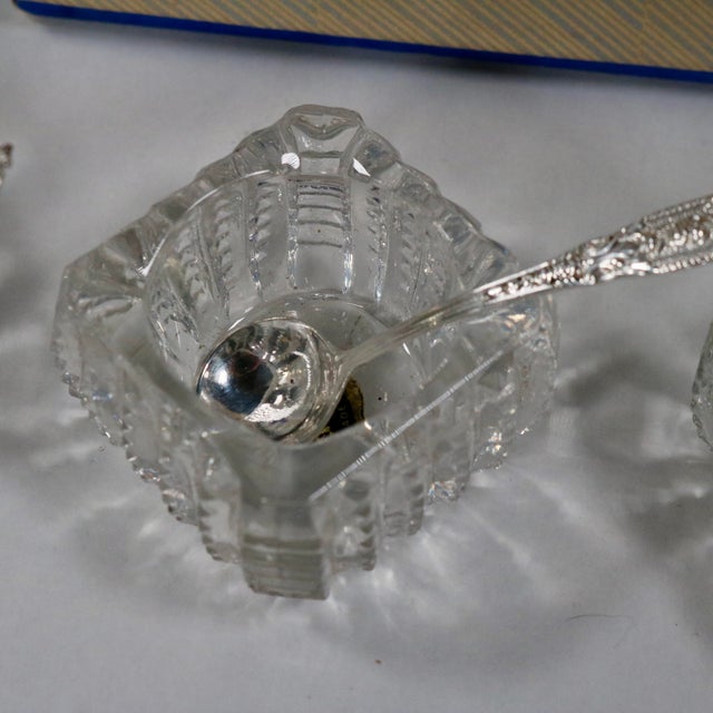 Produced by Westmorland Sterling Co in Wallingford, Connecticut. Fantastic set of glass salt cellars and sterling silver...
