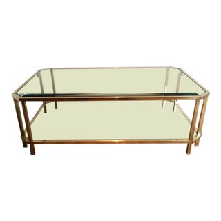 Mid Century Modern Roche Bobois Two Tiered Brass Coffee Table With Octagonal Corners and Beveled Top Glass Circa 1970 Pair of Tables For Sale