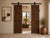 Antique Indian Carved Teakwood and Brass "Folk Art" Door, c. 1880, the 4 panels on each door (it opens in the middle)with...