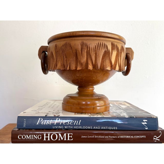Carved wooden pedestal bowl with ring handles. Please see condition details noted. Most items found at Pub & Oasis are...