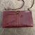 An Elegant 1950s Burgundy Leather and Bakelite Clasp Italian Shoulder Bag For Sale - Image 9 of 11