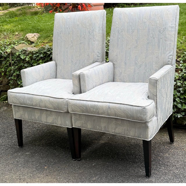 Impeccably crafted “Roland” dining chair by Designmaster furniture features a semi-attached, spring-down cushion seat and...