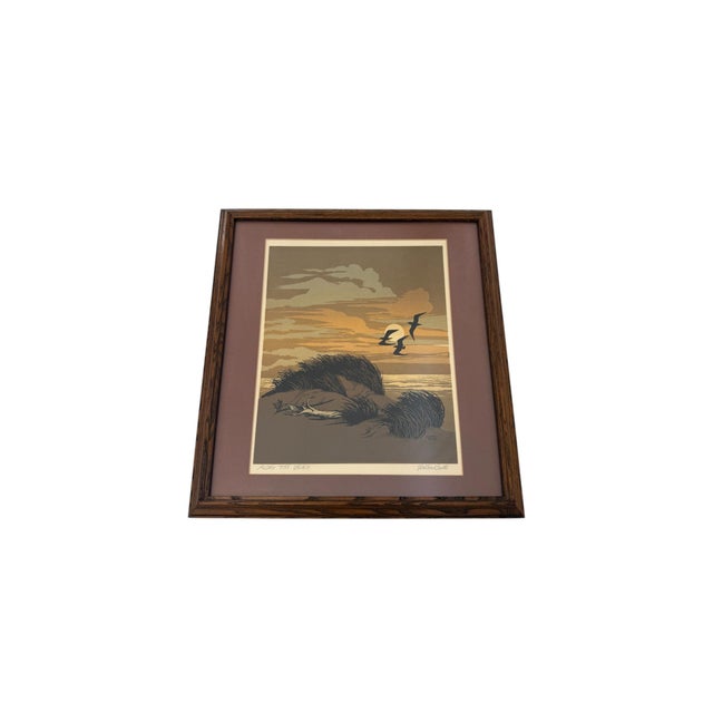 A serene vintage silkscreen or serigraph print titled “Along the Beach" by Walter Blount. This coastal scene captures a...