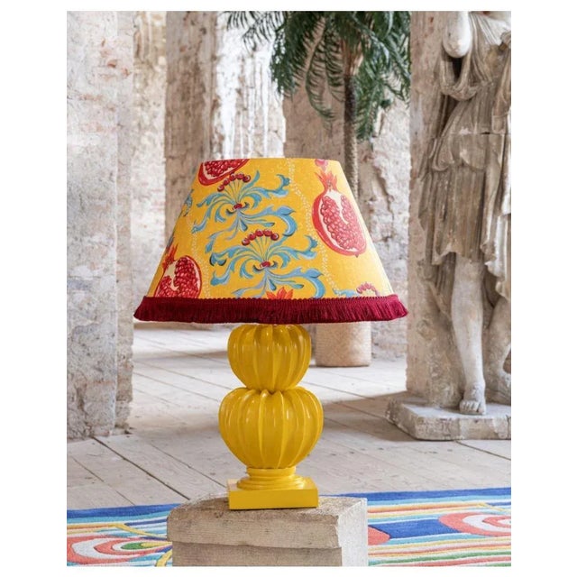 Vibrant hues of pomegranate burst forth, infusing any space with vitality through the MELAGRANATA lamp, a piece that...