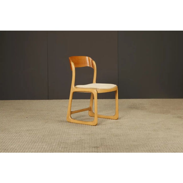 A lovely pair of side chairs and ottoman by Baumann France, circa 1970s. This bentwood Moller styled chairs feature a...