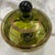 Lovely example of European art glass with the original sticker still intact. This olive green hand blown lidded candy dish...