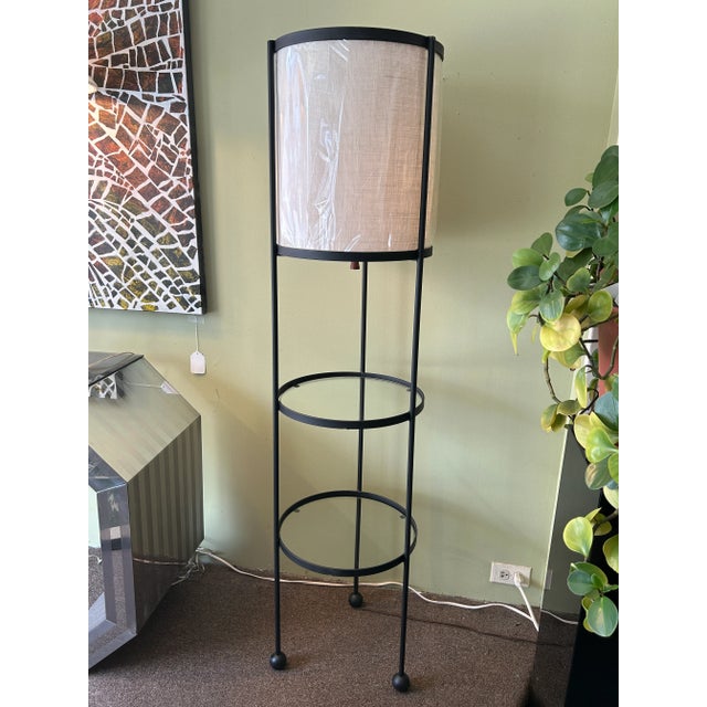 You are viewing a fantastic Iron and Glass Floor Lamp + Shelves by Frederic Weinberg c1950s. This classic modern design...