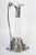 This magnificent claret jug by the silversmith Orivit is a prime example of the Art Nouveau movement, dating from circa...