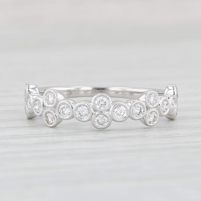 Gemstone Information: - Natural Diamonds - Total Carats - 0.47ctw Cut - Round Brilliant Color - H - J Clarity - VS2 Metal:...