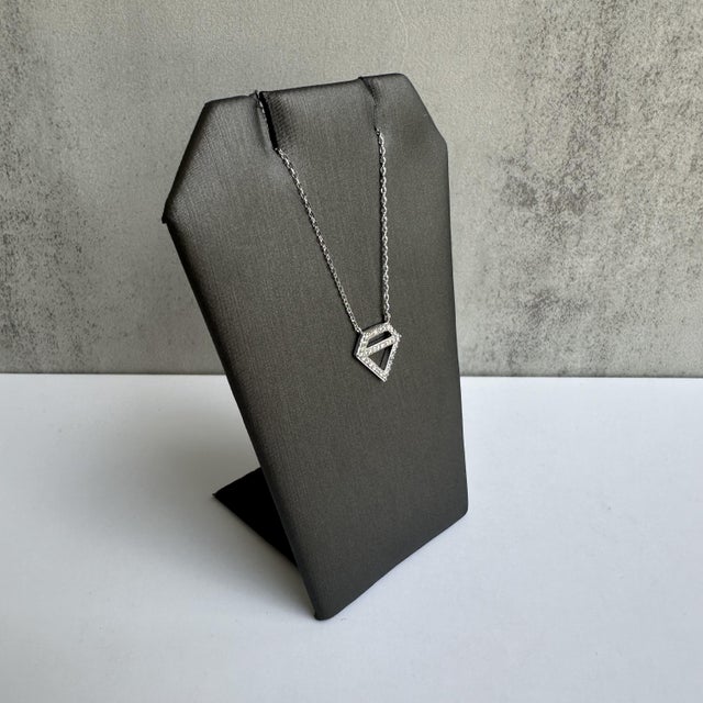 Enhance your jewelry collection with this exquisite 14kt White Gold Diamond Shaped Diamond Necklace. Featuring 0.15 carats...