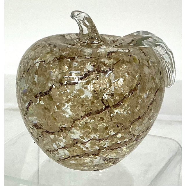 Pretty vintage Murano glass apple. Clear with gold leaf specks and brown swirls. No markings.