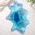 A large handmade ocean wave bowl crafted from epoxy resin with crushed glass accents in Naples, Florida. The flowing...
